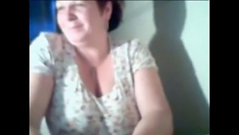 Older Woman Revealing Her Breasts On Webcam